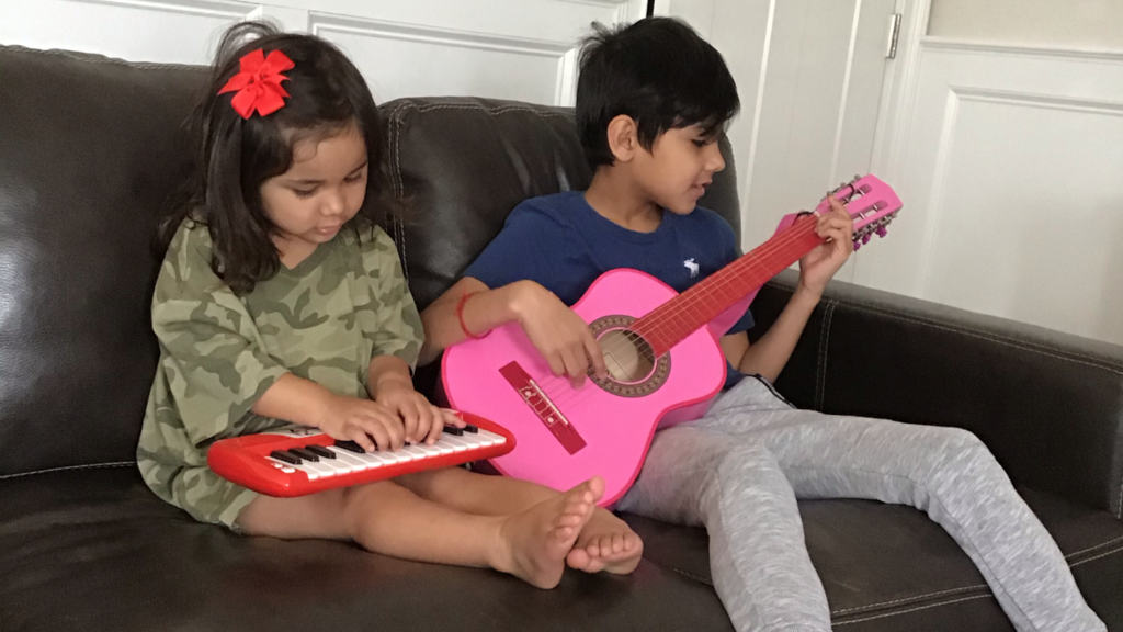 Gustavo plays guitar