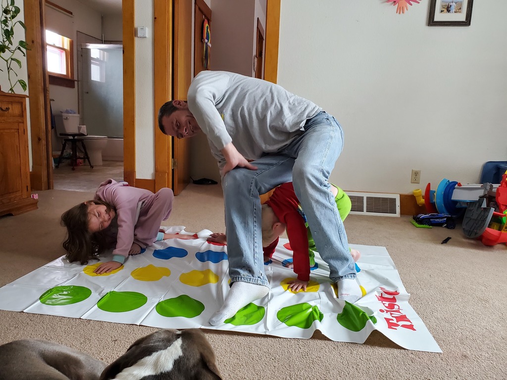 kids and dad playing twister