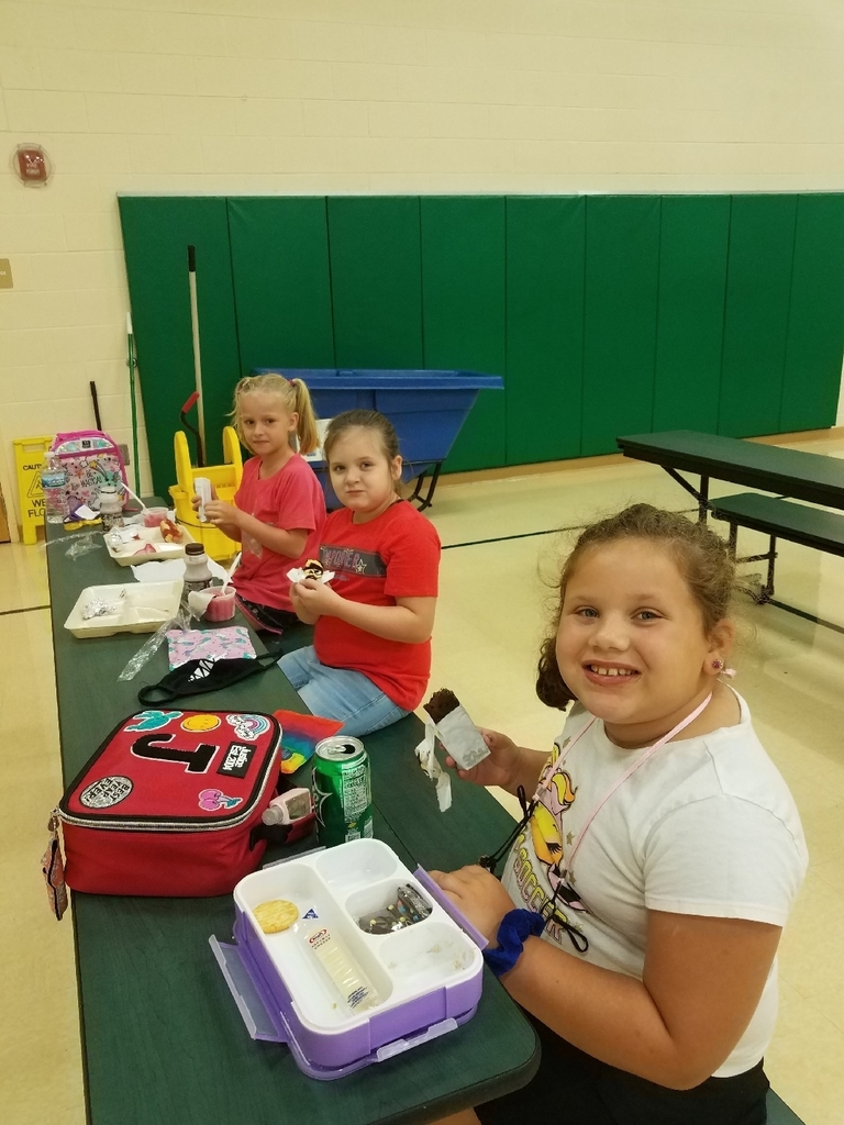 Students eating ice cream.