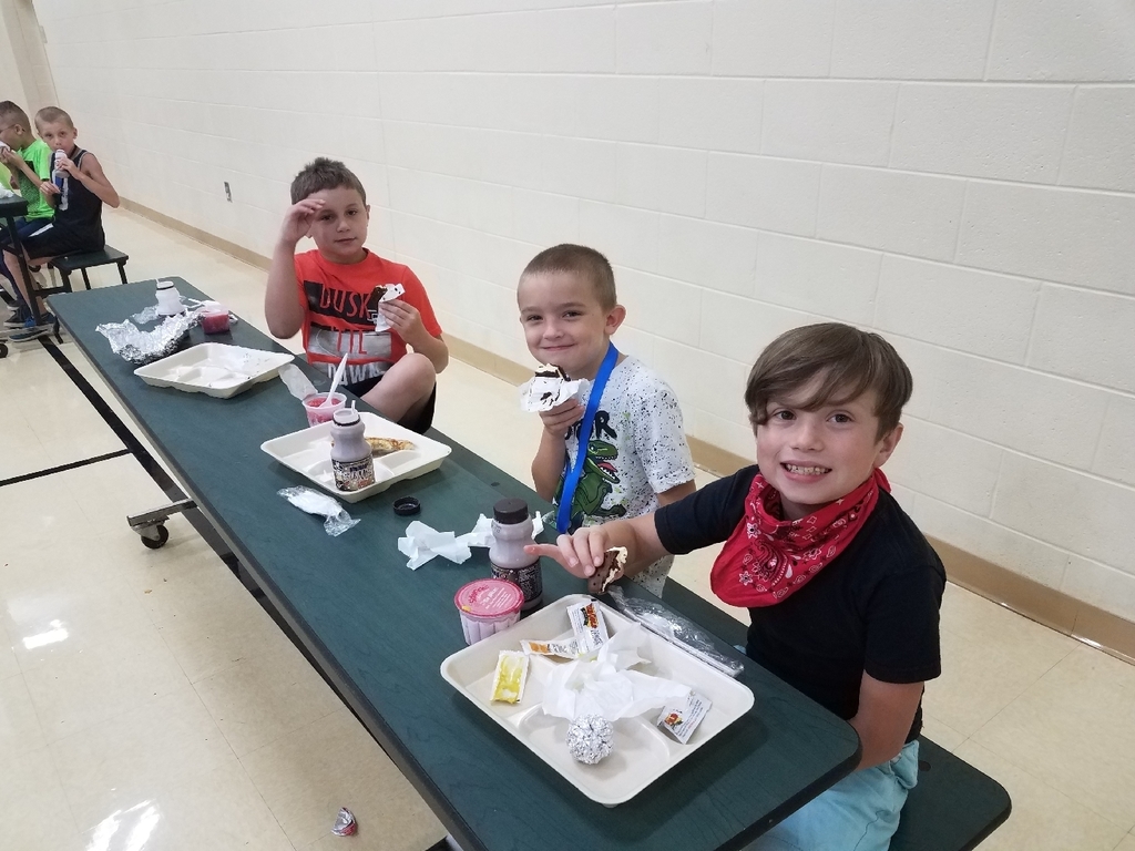 Students eating ice cream.
