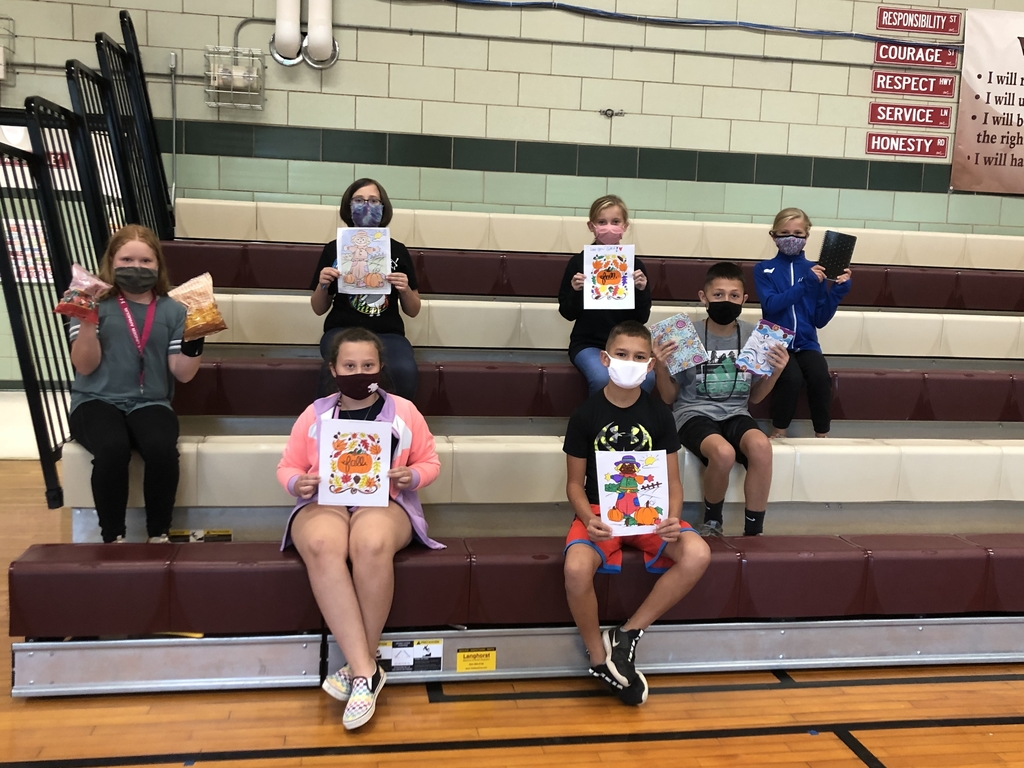 A few of our fifth graders are showing off part of our care package for local nursing home residents.   The fifth graders also wrote letters to residents to help brighten their days.