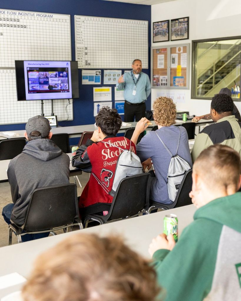 Kids looking at presenter.