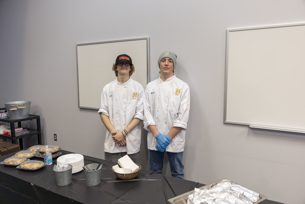 Two boys looking at the camera.