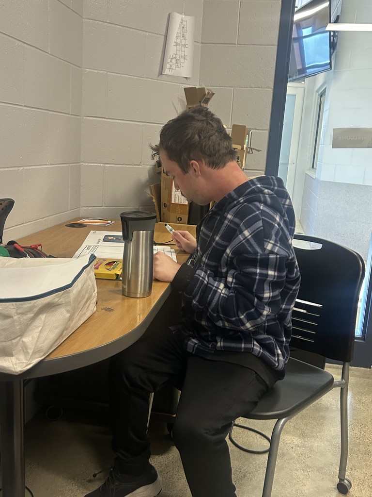 A student sitting at a desk