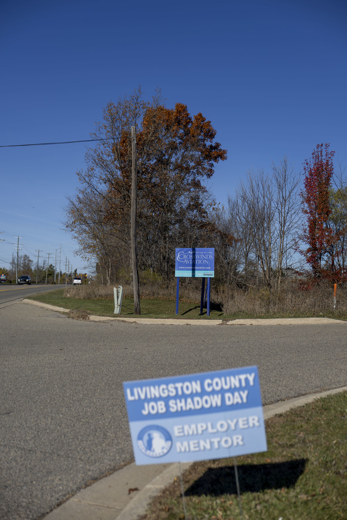 Liv Co Job Shadow Day employer mentor sign outside of Crosswinds Aviation