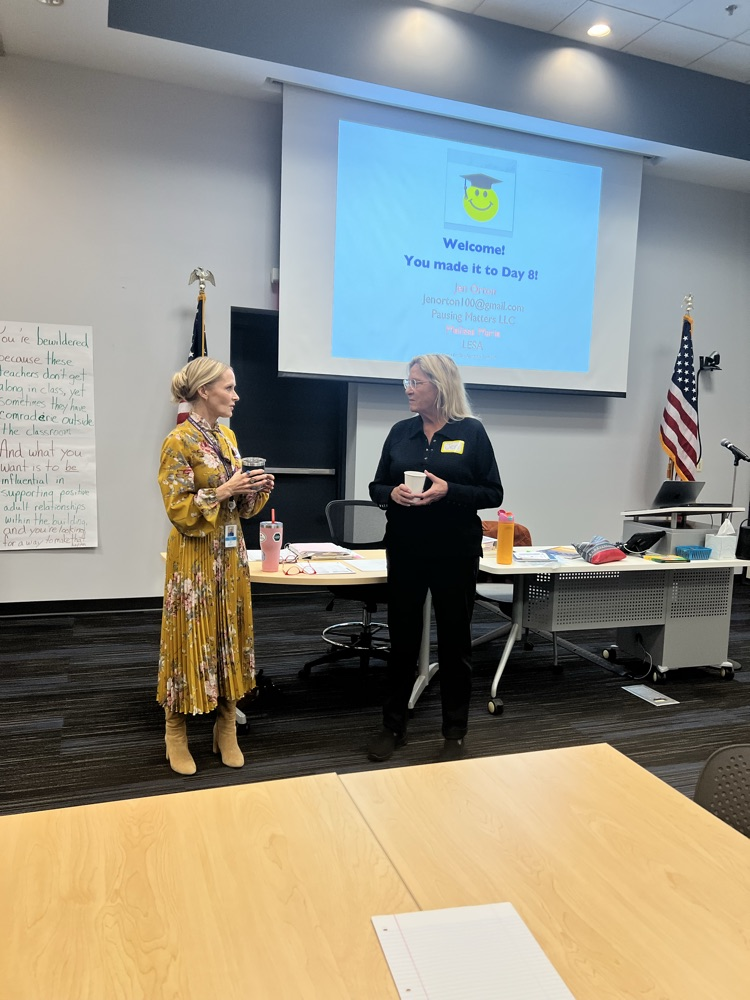 Two women leading Cognitive Coaching 