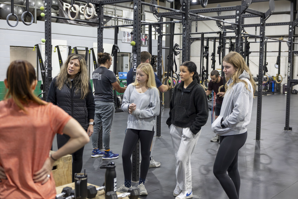 Students job shadowing a coach and personal trainer