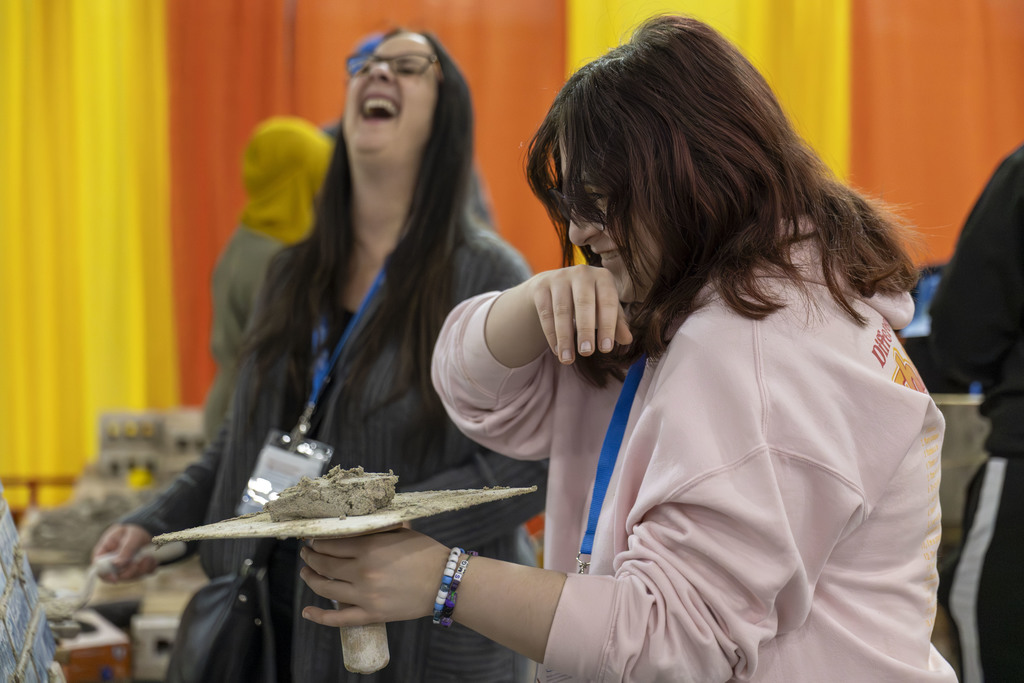 Student and Teacher laughing