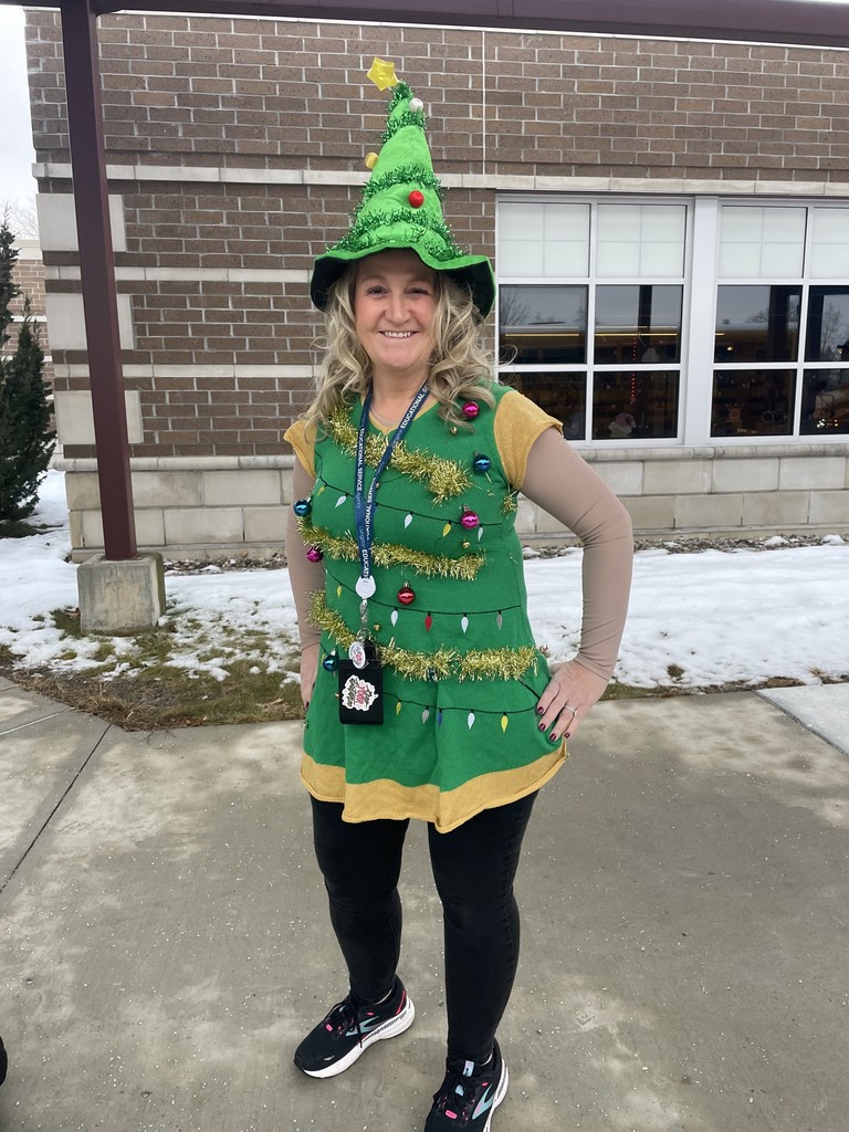 Women dressed as Christmas Tree.
