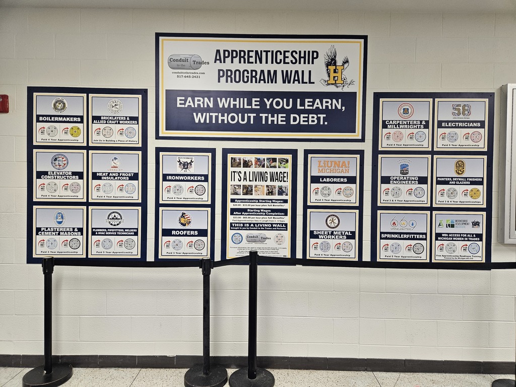 Wall at Hartland High School with squares that contain information about apprenticeship programs. 