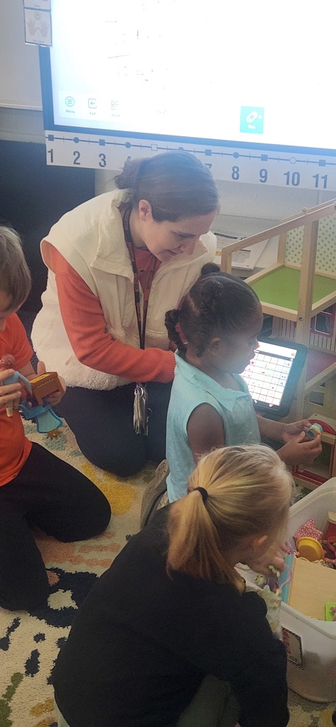 Staff models use of language device 