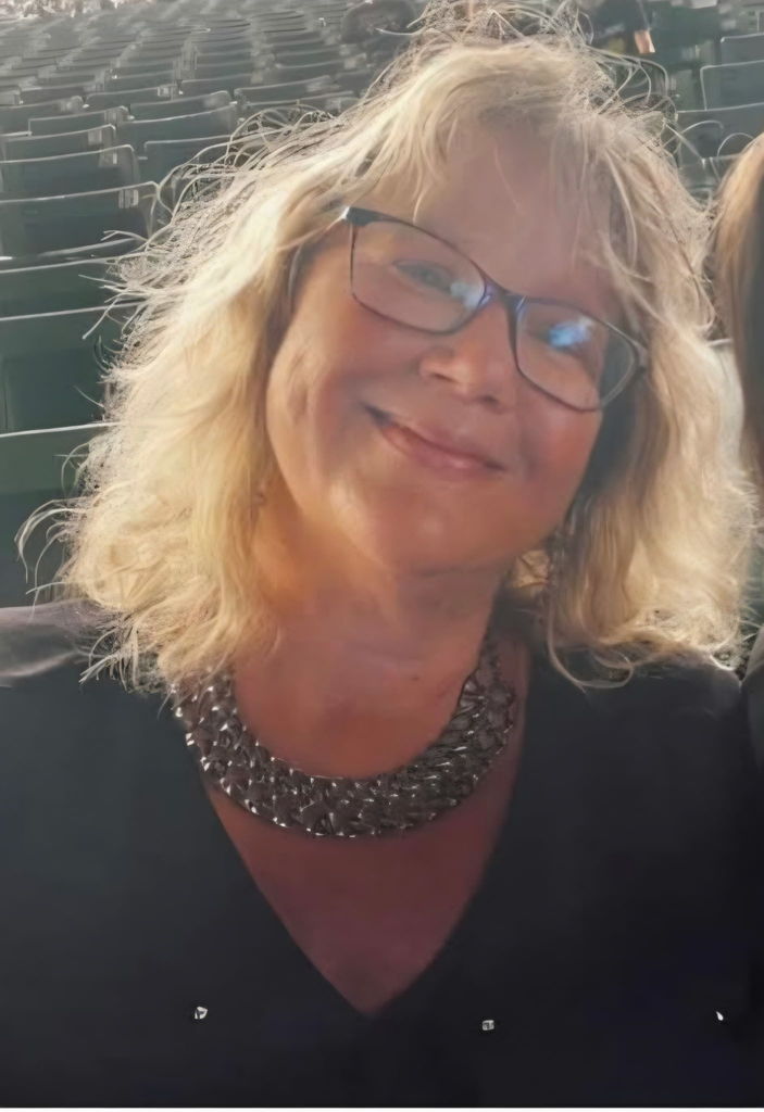 Selfie of a woman in a theatre