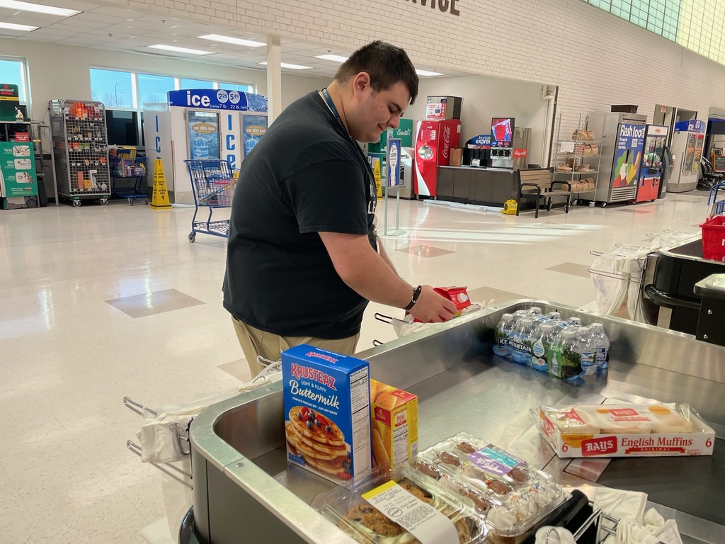 Person bagging groceries 