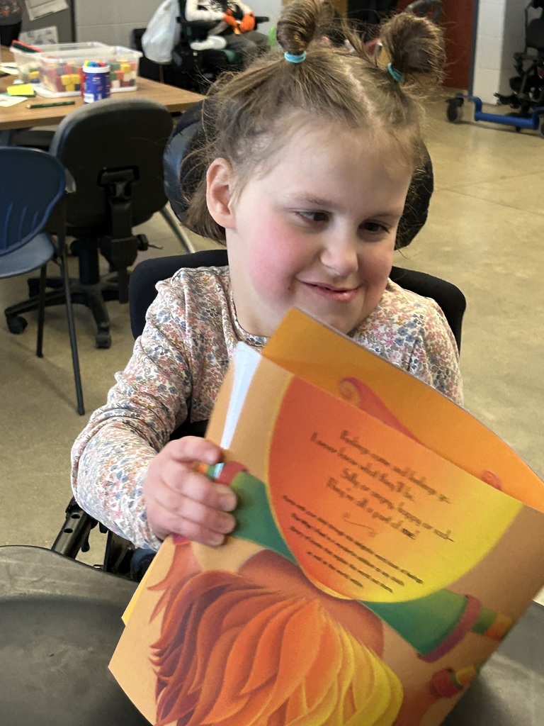 A student looking at a book