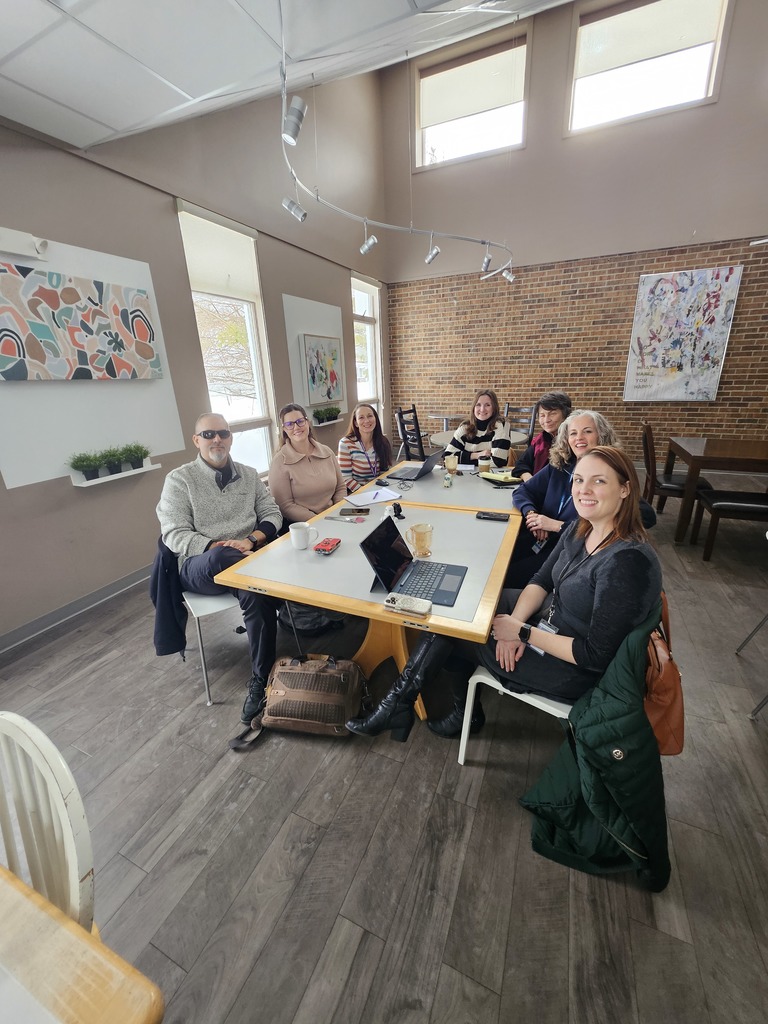 Group of people sitting at the table
