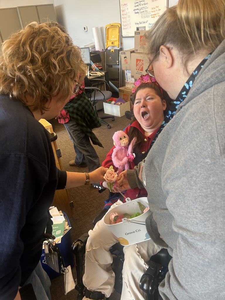 Student passing out Valentines