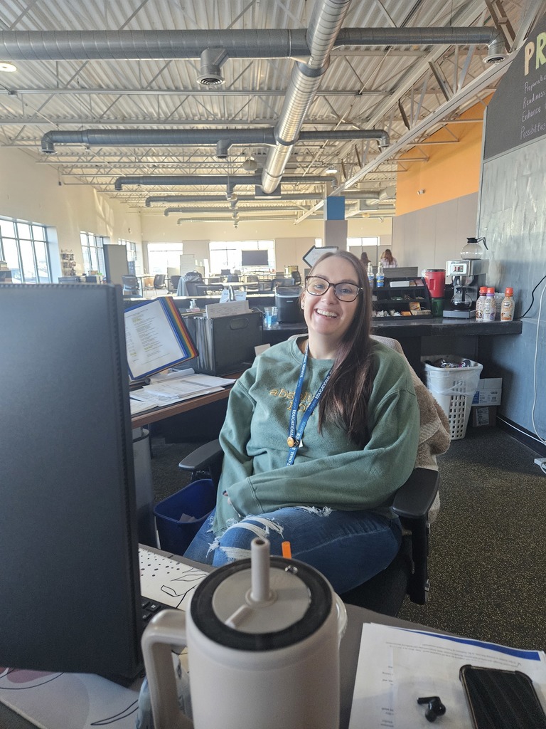 Person sitting behind a desk
