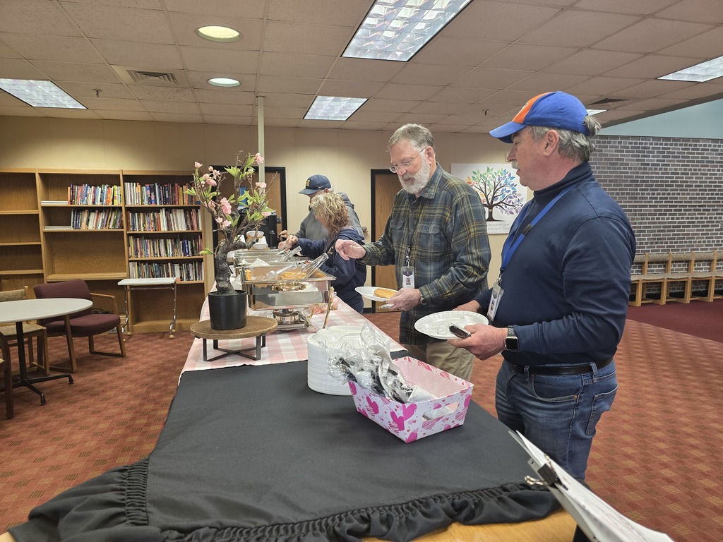 Bus drivers enjoying some breakfast from the PTO