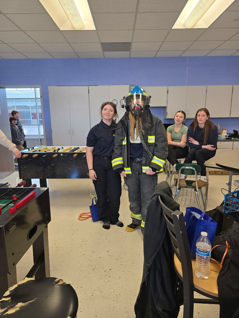 Student wearing firefighter gear