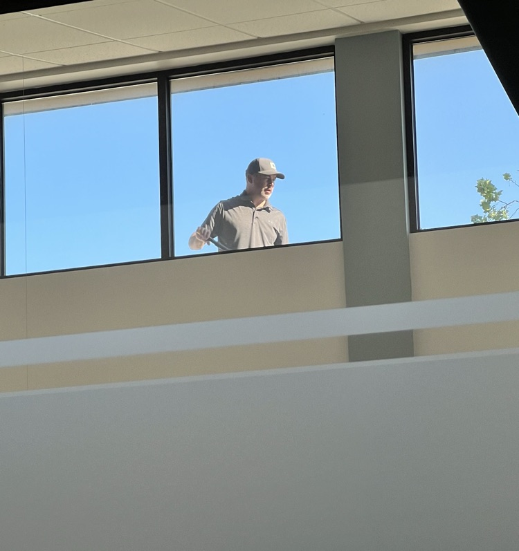Staff member on roof, clean and painting