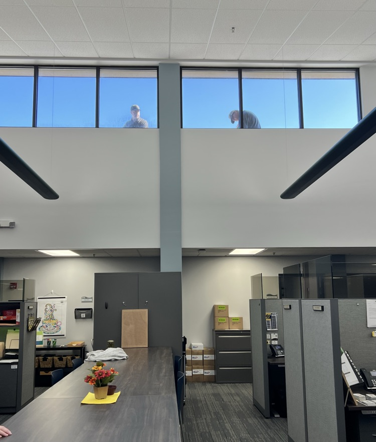 Staff member’s on roof, clean and painting