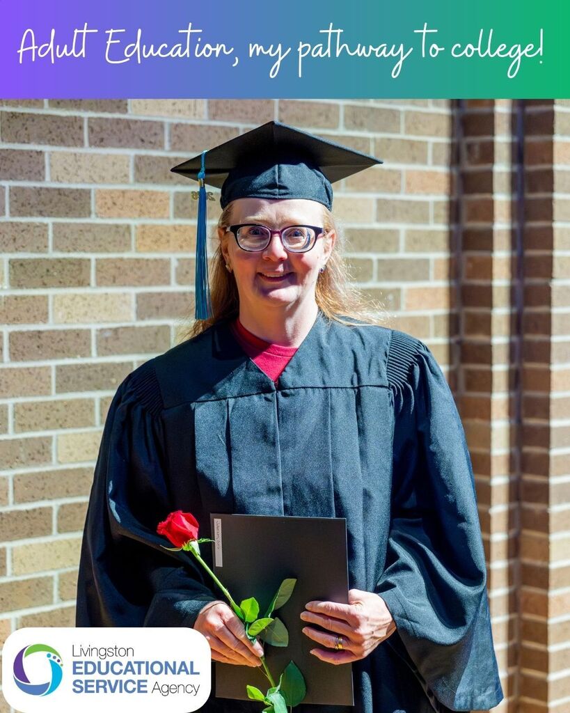 A graduate wearing a cap and gown holds a diploma and a red rose in front of a brick wall, with top text reading "Adult Education, my pathway to college!" alongside the Livingston ESA logo.