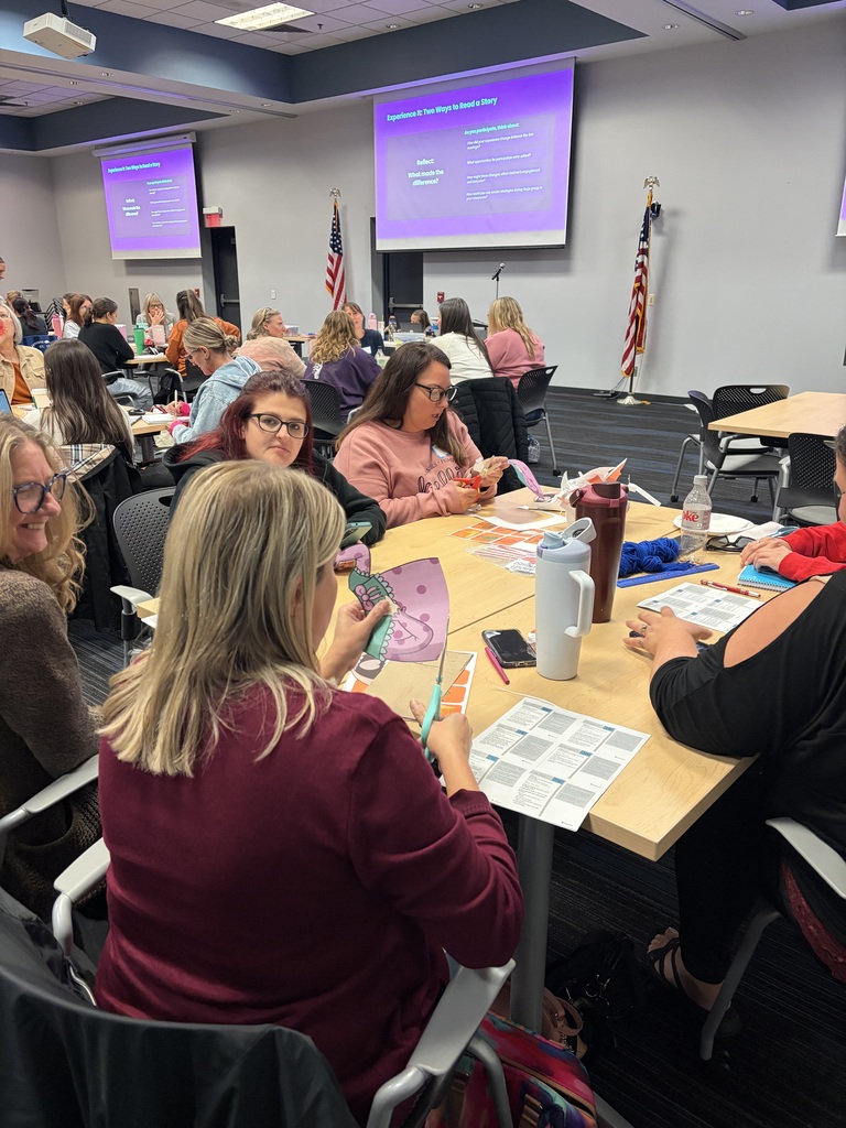 Preschool teachers collaborate during a professional learning day, creating colorful puppets and hands-on materials to bring back to their classrooms and support learning through play.