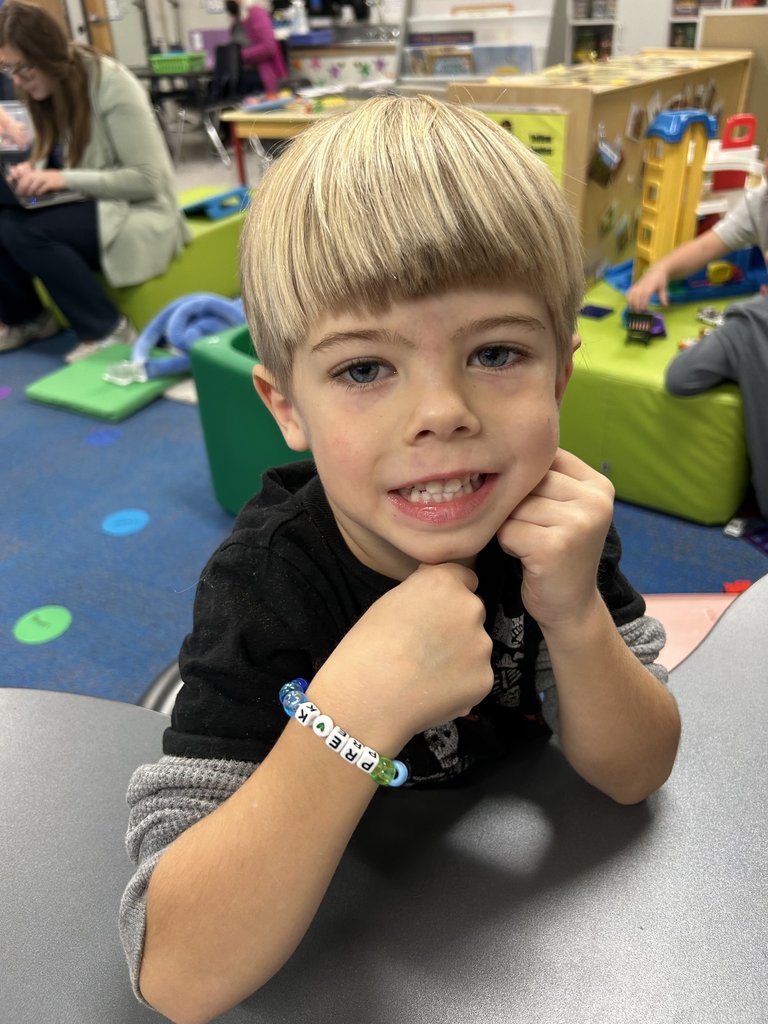 prek student with friendship bracelet