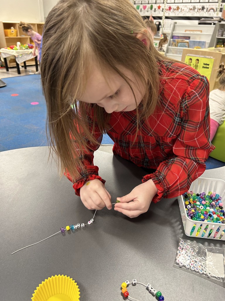 prek student with friendship bracelet