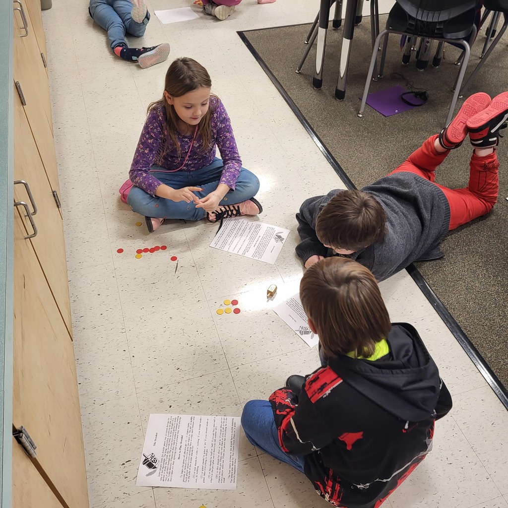 students playing dreidel