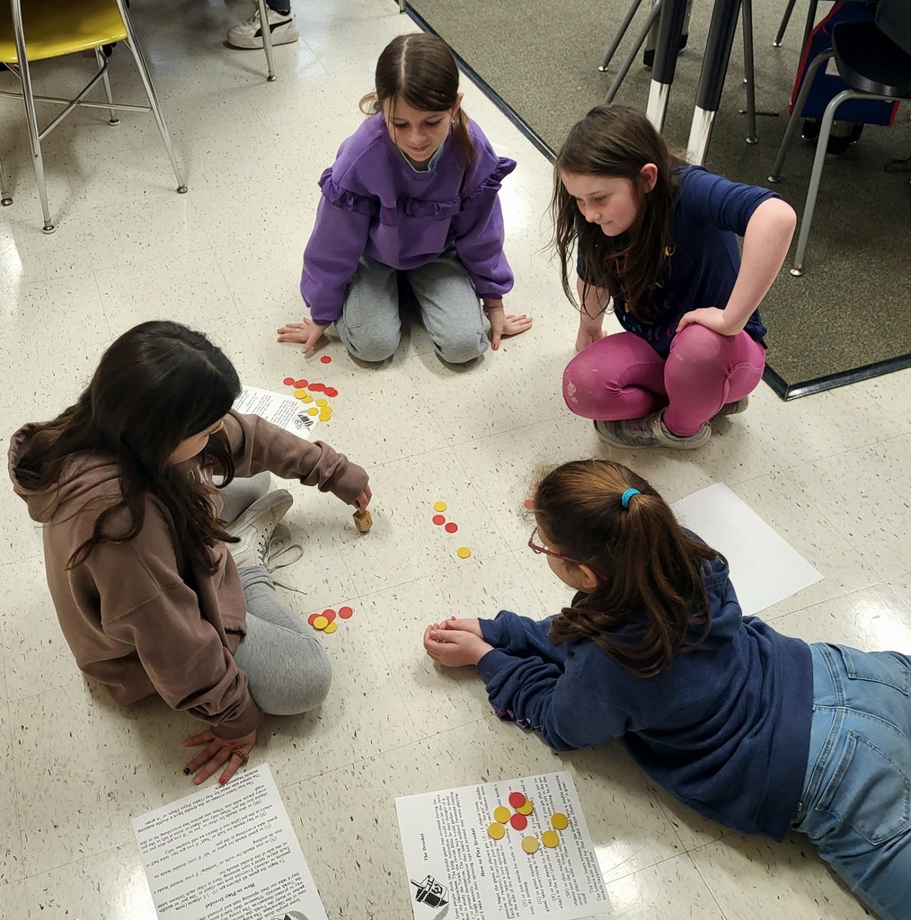 students playing dreidel