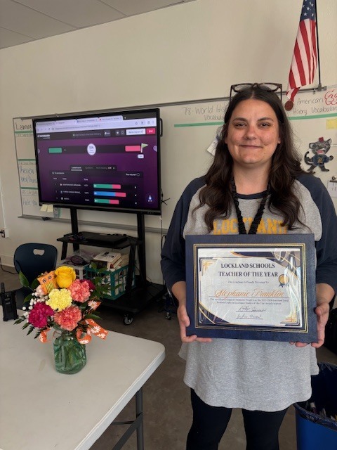 Photo of teacher Stephanie Franklin with Award