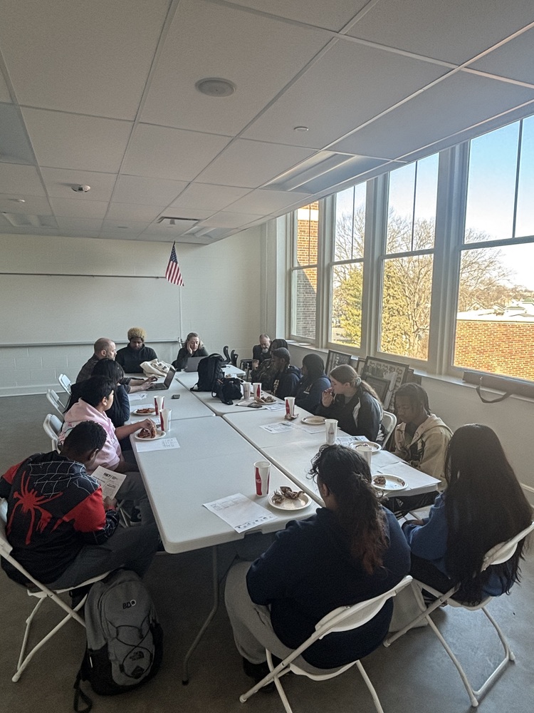 Students and the Superintendent seated around  rectangular tables for the first Superintendent's Advisory Group