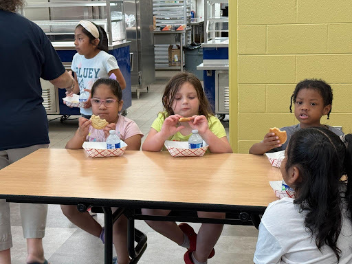 Young students eating a snack