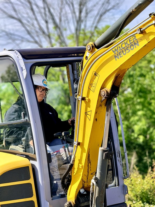 student driving machinery