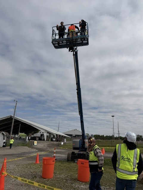 lift platform high up with students