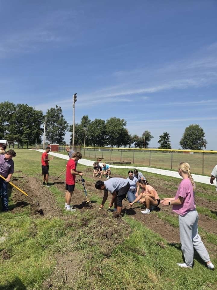 Mr. Robertson's Greenhouse Management Class planting their Garden
