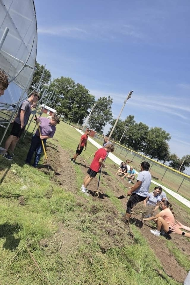 Mr. Robertson's Greenhouse Management Class planting their Garden