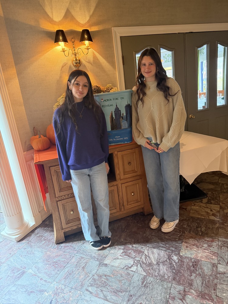 Locust Valley High School’s Interact Club officers Angelina Iodice and Meghan Johnson accepted second place and a donation from the Evan R. Liblit Memorial Scholarship Fund Committee.