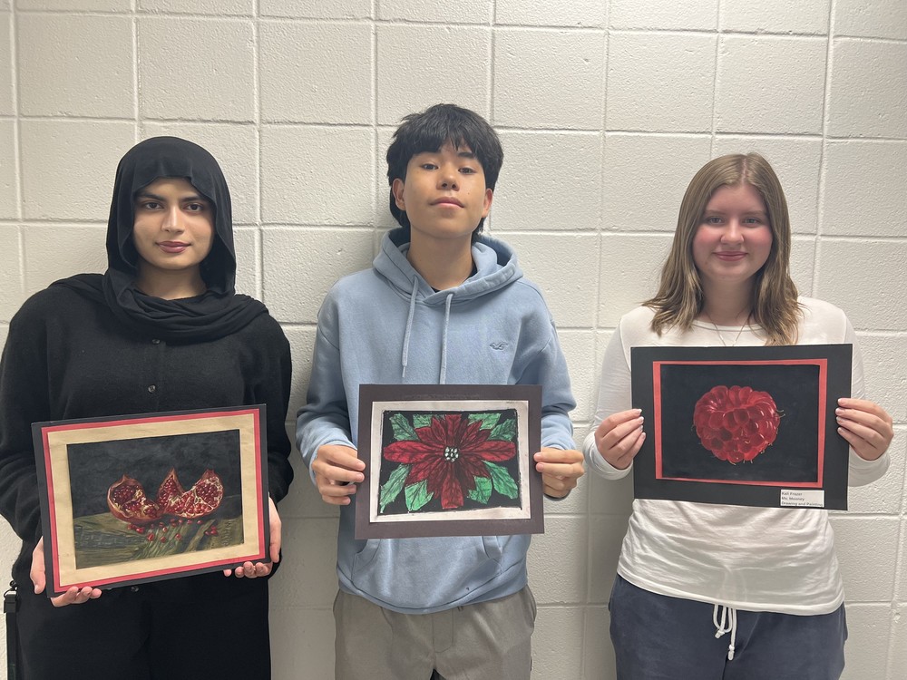 Locust Valley High School students Humnaa Abid, Sebastian Canales and Kali Frazer (left to right) and alumna Annemie Germans (not pictured) earned recognition from the Cornell Cooperative Extension.