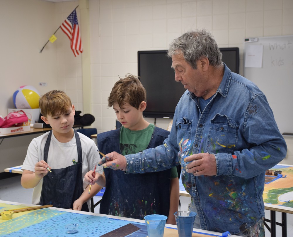 BI students work with artist John DiNaro.