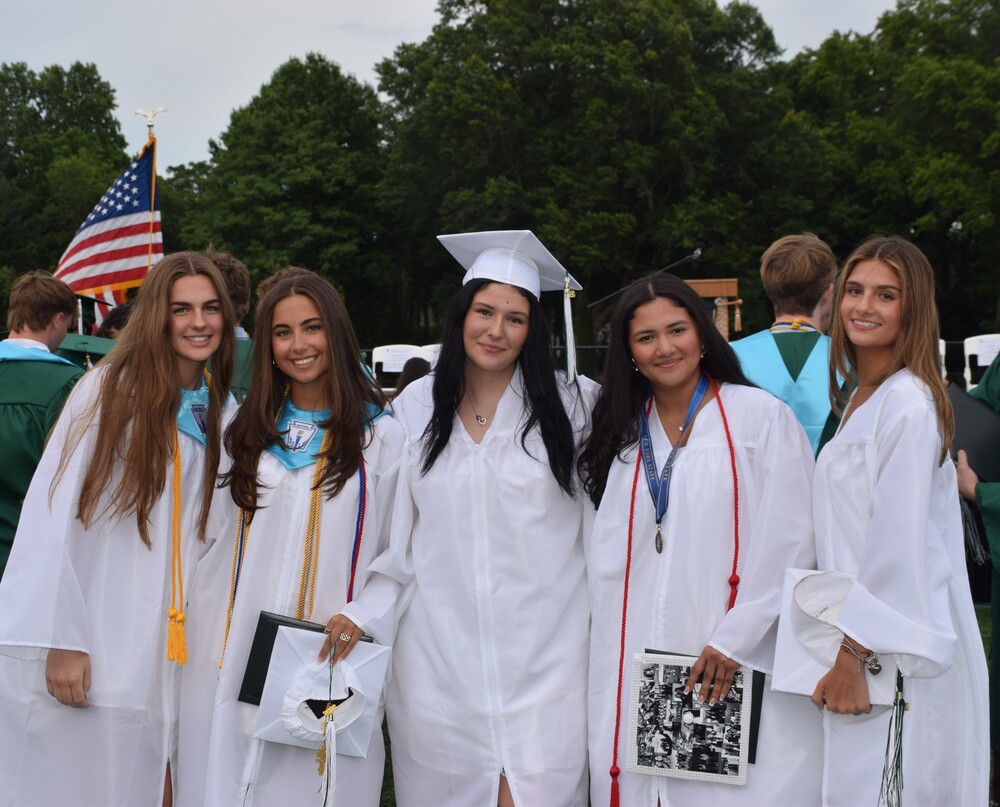 Seniors Olivia Manning, Melanie Quezada, Sophia Georgiopoulos, Darling Acosta and Olivia Fligr celebrated together after the ceremony concluded.