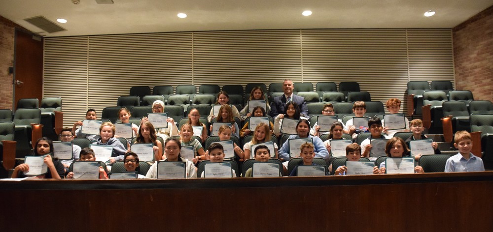 1)	Forty Locust Valley Middle School students were honored for their random acts of charity to classmates and staff as part of the ‘Caught Being Kind’ program.