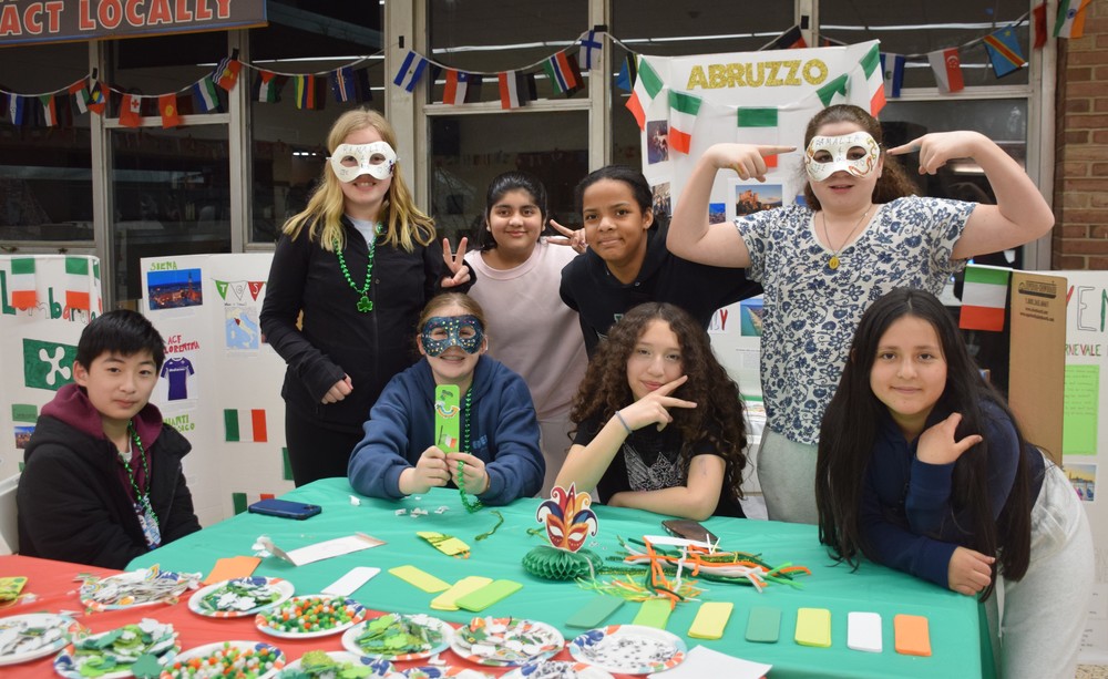 Middle school students design carnivale masks at International Night 2026.