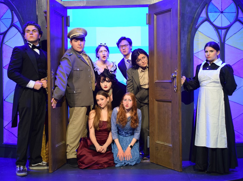 The Clue cast is ready for opening night.