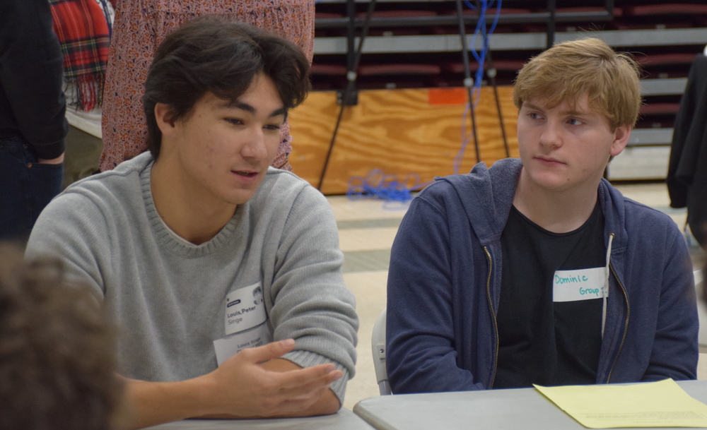Locust Valley High School alumnus Louis Singe speaks about his college experience with current junior Dominic Spina.
