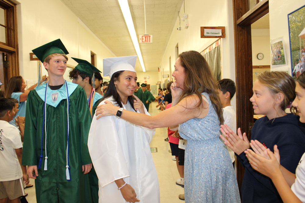 A member of the Class of 2026 reunites with an LVI teacher.