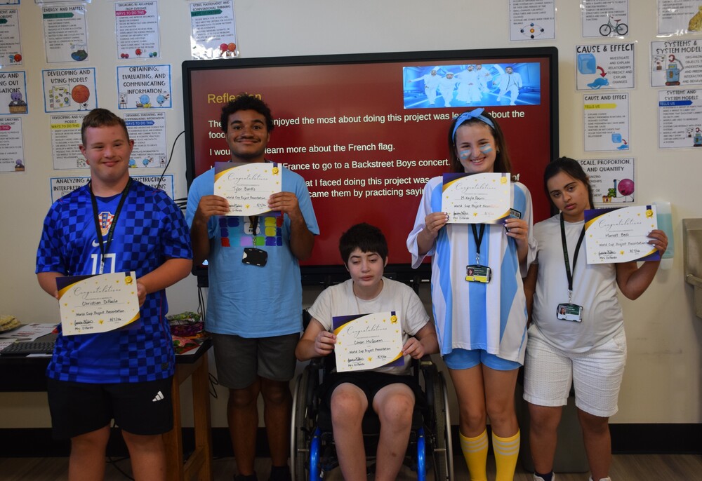 Extended school year students received certificates for their presentations on other countries and their cultures.