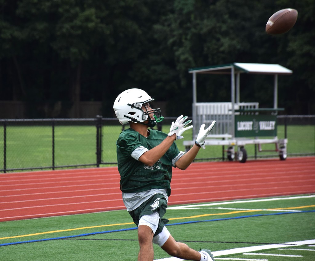 A Falcons' receiver hauls in a catch.
