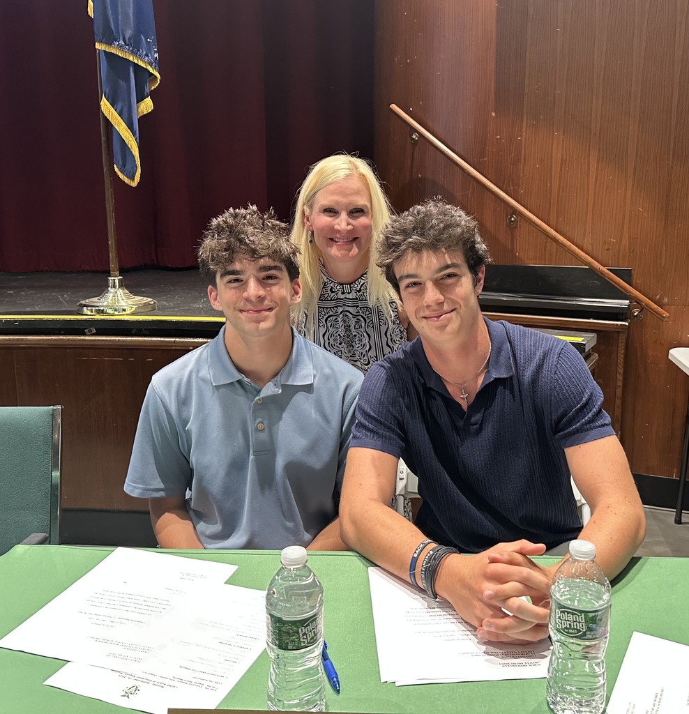 Superintendent Dr. Kristen Turnow welcomes new student ex-officio members of the board of education Grant Creedon and Christian Ciccone.